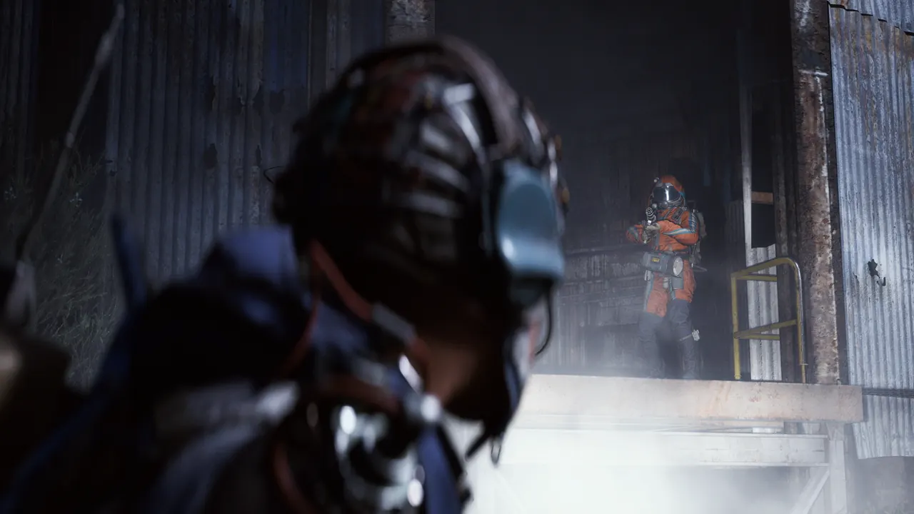 An ARC Raiders player in an orange jacket fighting a flying ARC machine in a sandy ruin